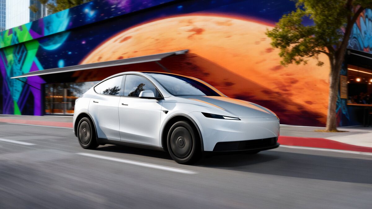 The 2026 Tesla Model Y Standard in white seen from a front quarter angle