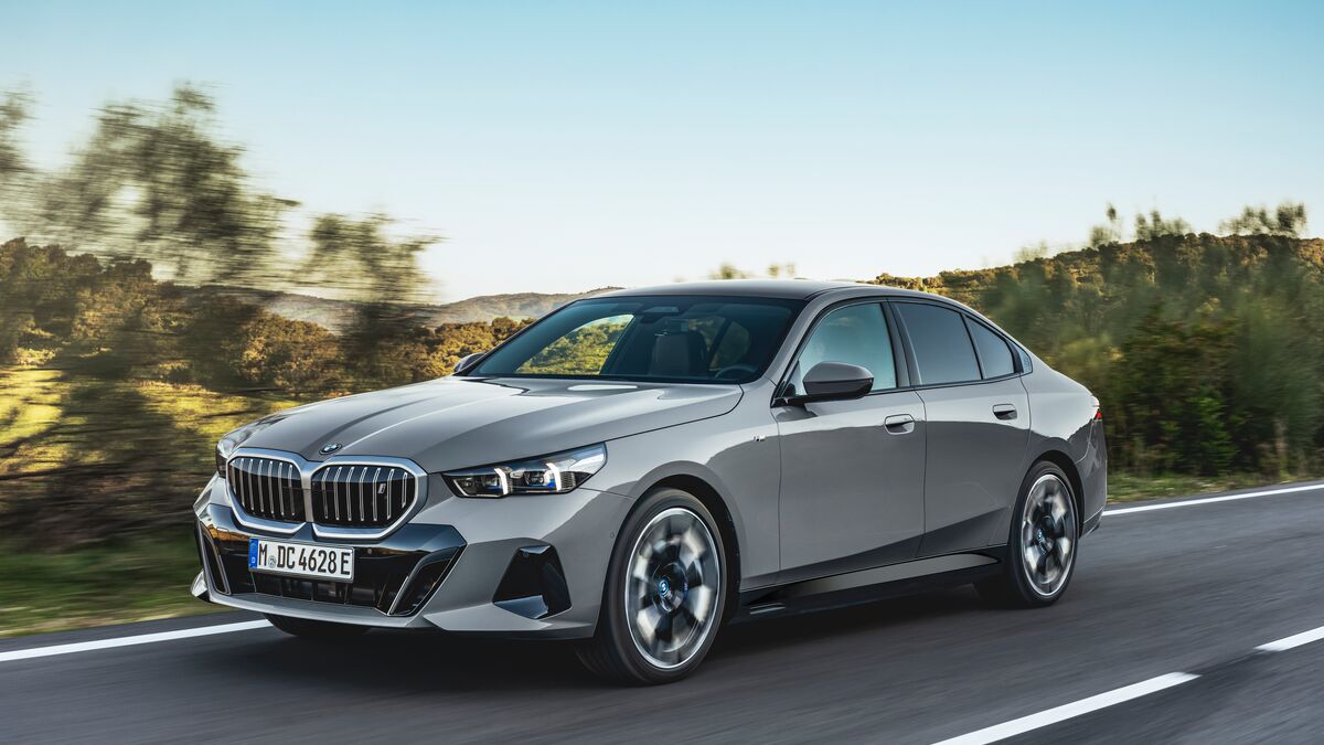 The 2025 BMW i5 in gray seen from a front quarter angle