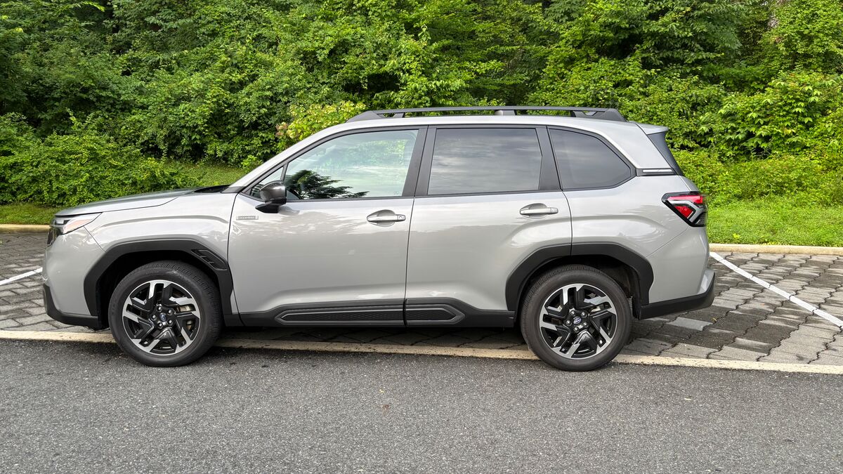 The 2025 Subaru Forester Limited Hybrid in River Rock Pearl seen in profile
