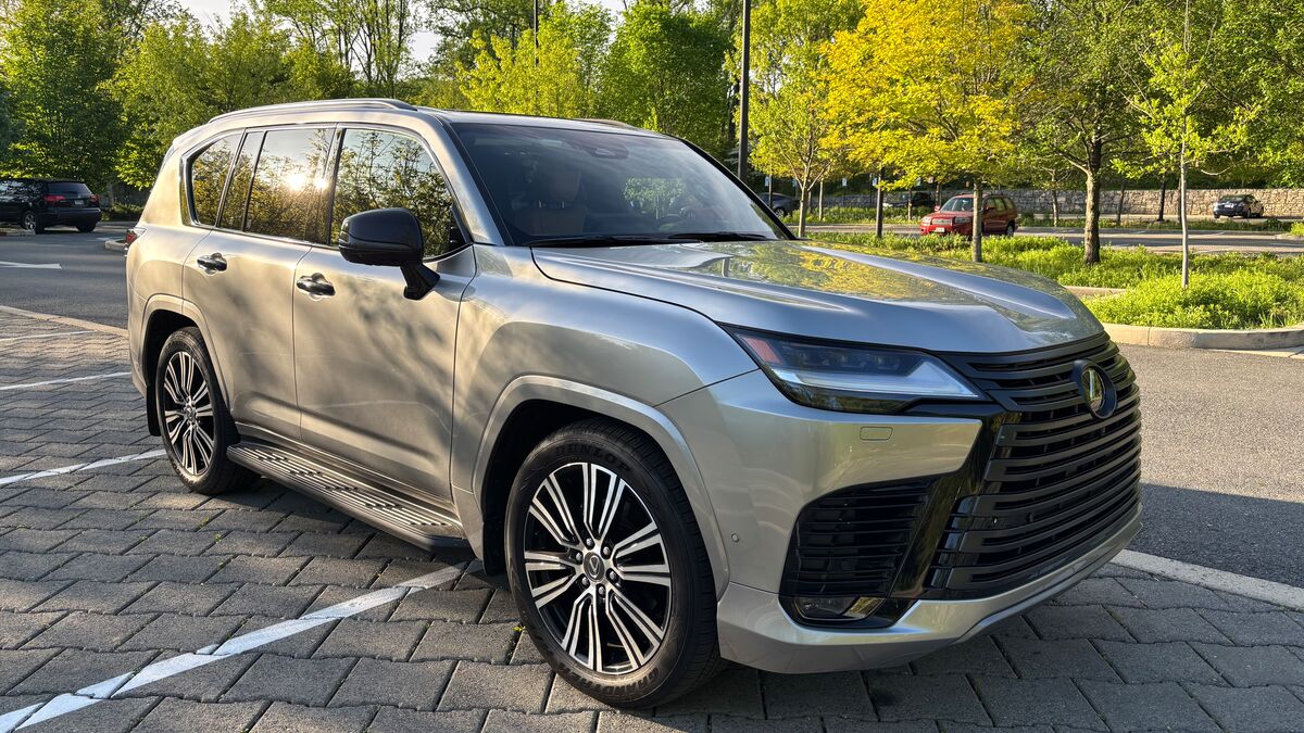 The 2025 Lexus LX in beige seen from a front quarter angle