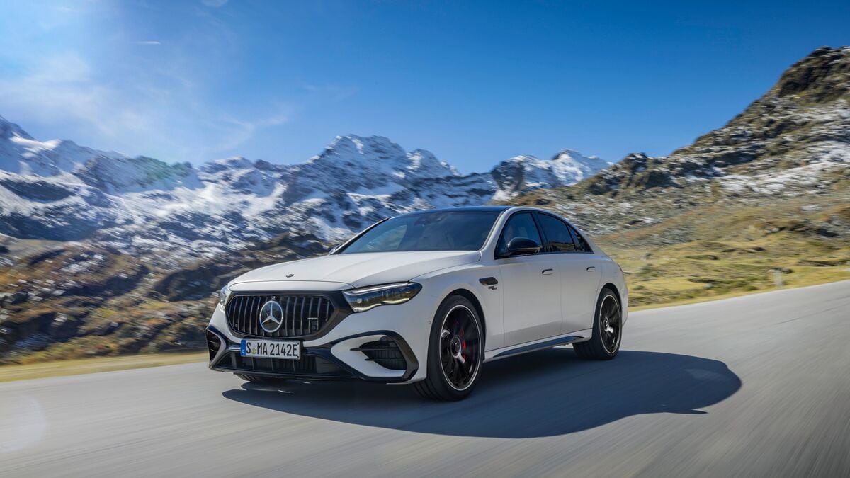 The 2025 Mercedes-AMG E 53 PHEV 4Matic+ in white seen from a front quarter angle