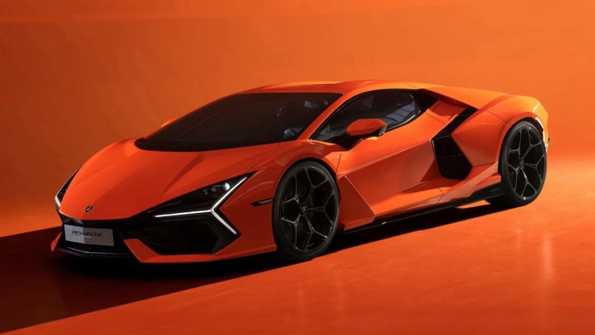 The 2025 Lamborghini Revuelto in orange seen from a front quarter angle