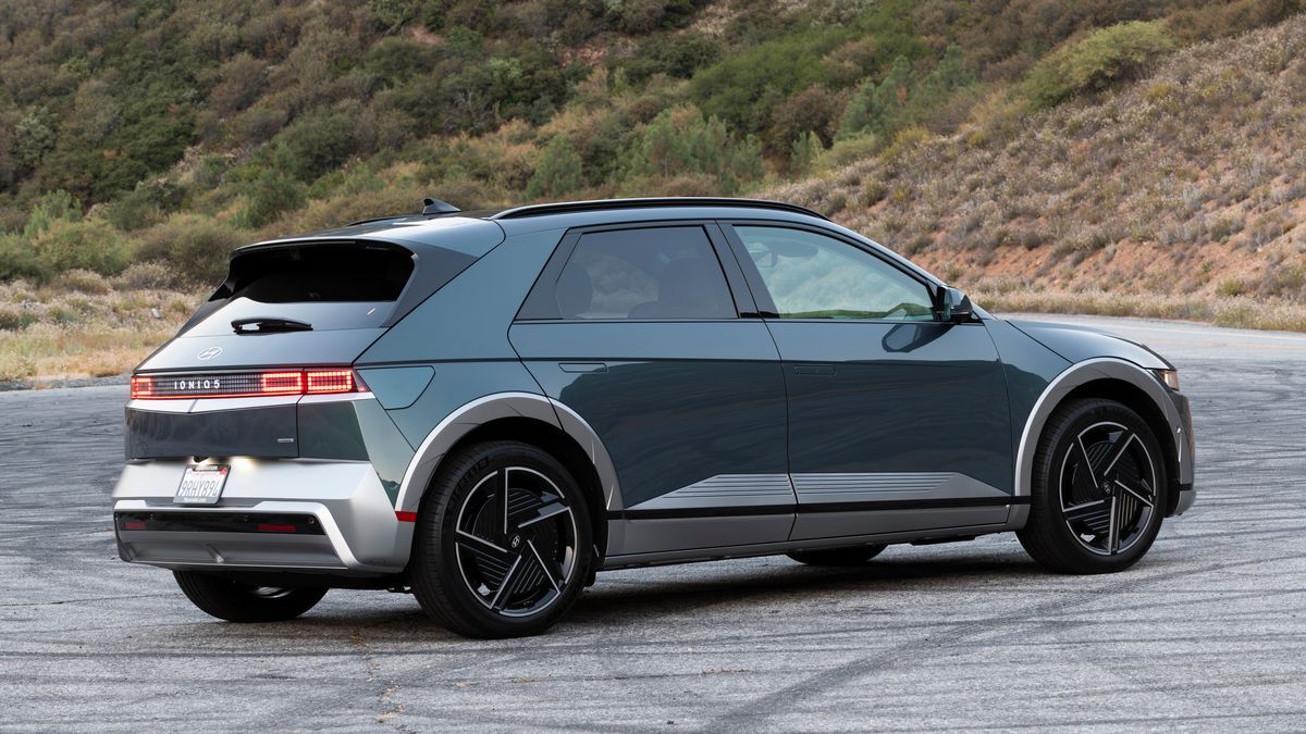 The 2025 Hyundai Ioniq 5 in gray seen from a rear quarter angle