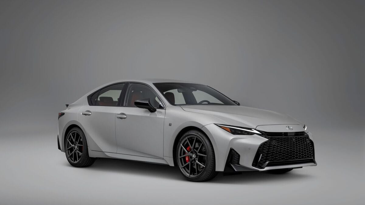 The 2026 Lexus IS in gray seen from a front quarter angle