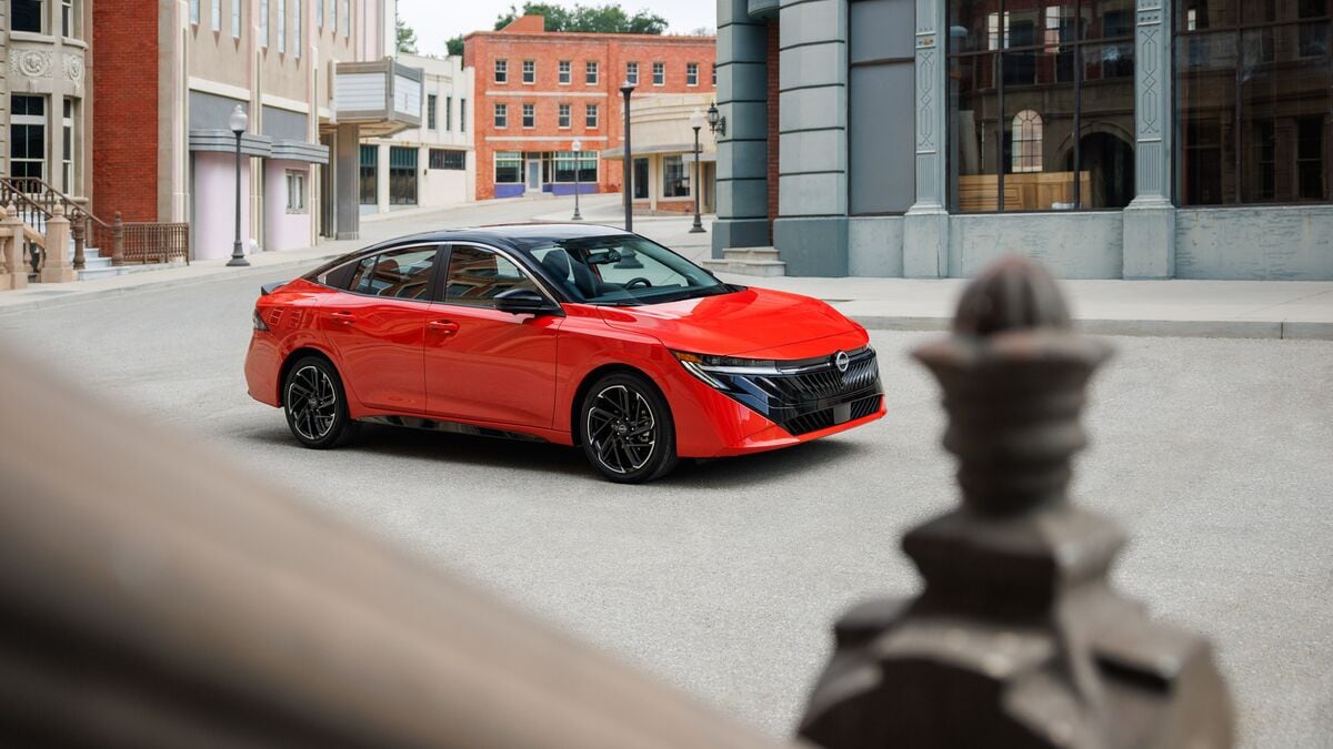 The 2026 Nissan Sentra in red seen from a front quarter angle