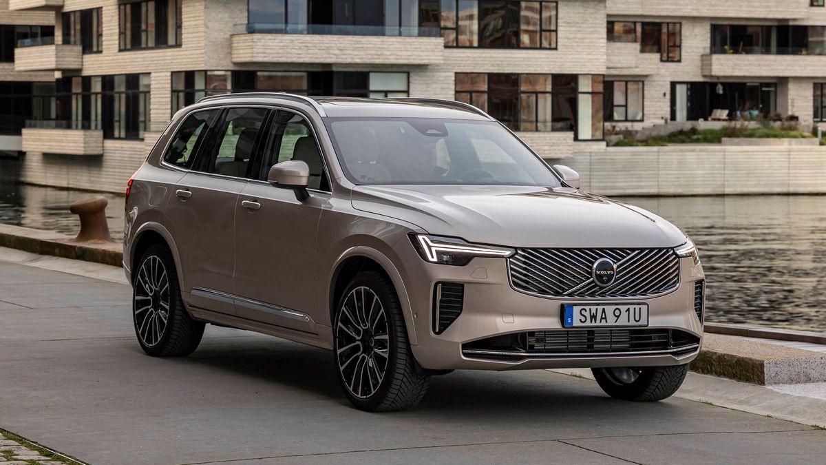 The 2026 Volvo XC60 in khaki seen from a front quarter angle