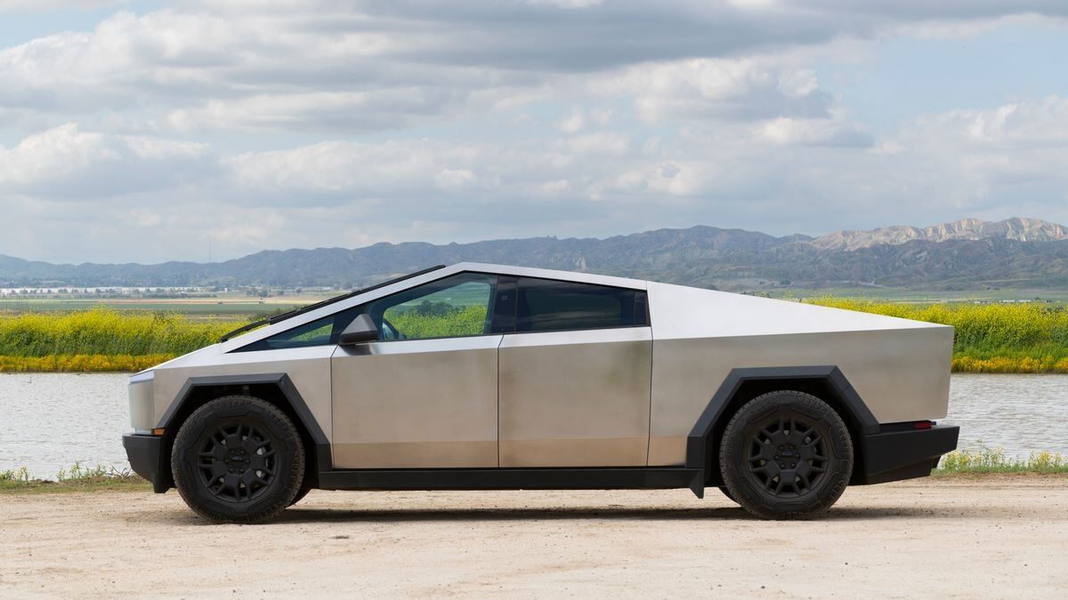https://kbb.com/asset/f602885e-ca83-4df5-972e-a344c030cdc4/OG/2025-tesla-cybertruck-profile-left.jpg