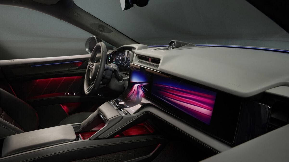 The cabin of the 2026 Porsche Cayenne EV, with its curved screen