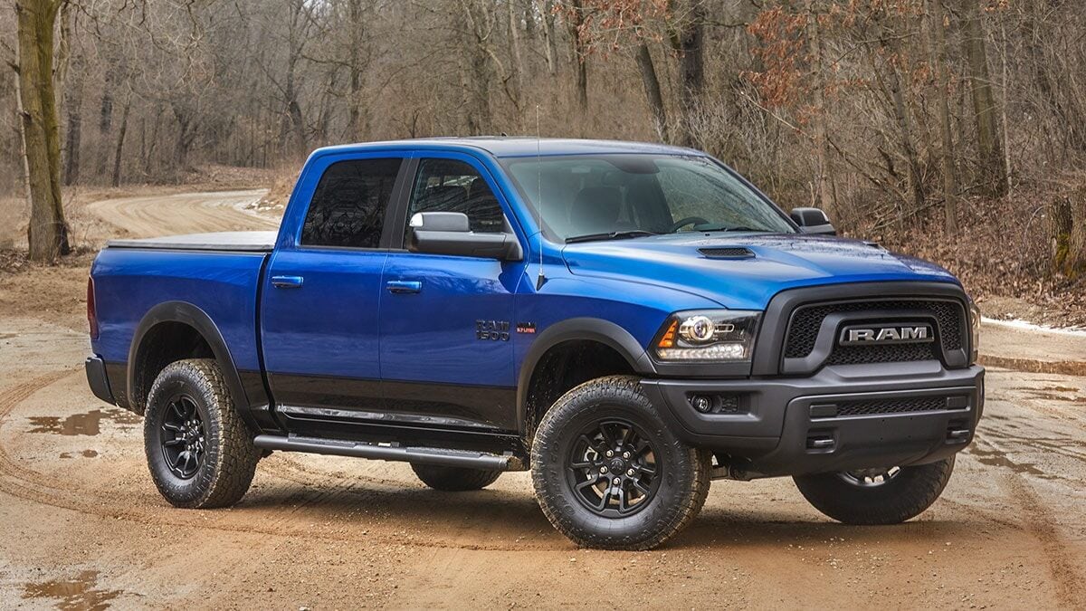 The 2018 Ram 1500 Rebel in blue seen from a front quarter angle