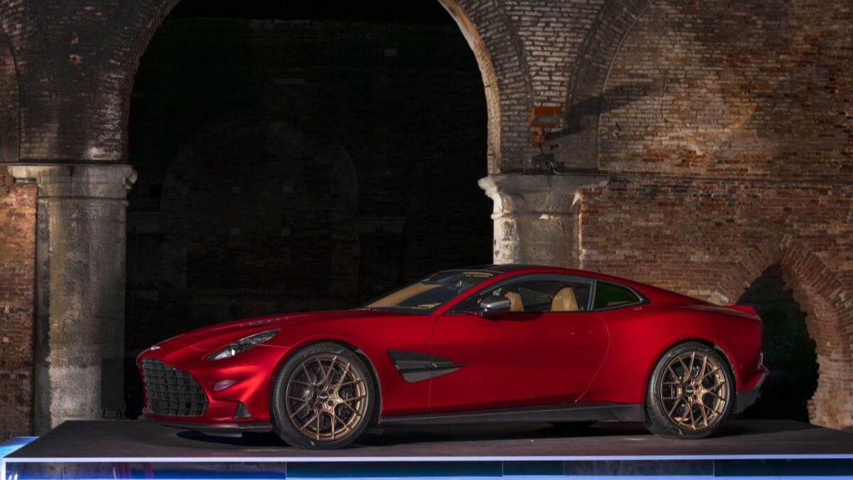 The 2025 Aston Martin Vanquish coupe in red seen from a front quarter angle