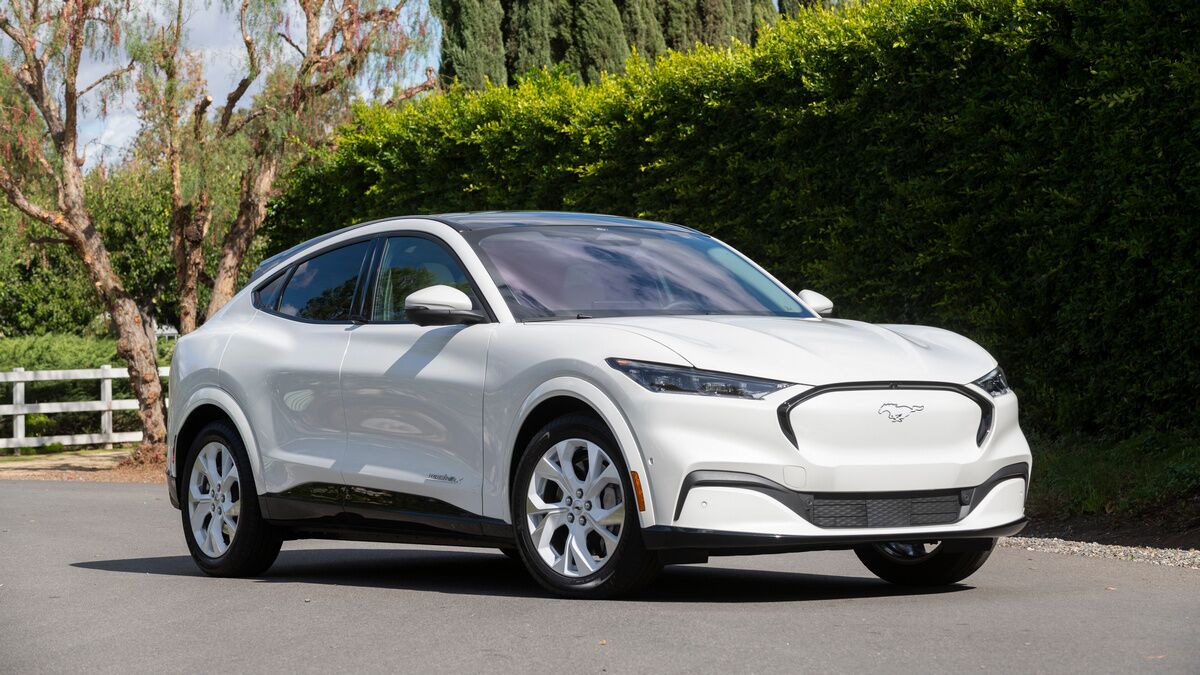 The 2022 Ford Mustang Mach-E with the Ice White Package seen from a front quarter angle
