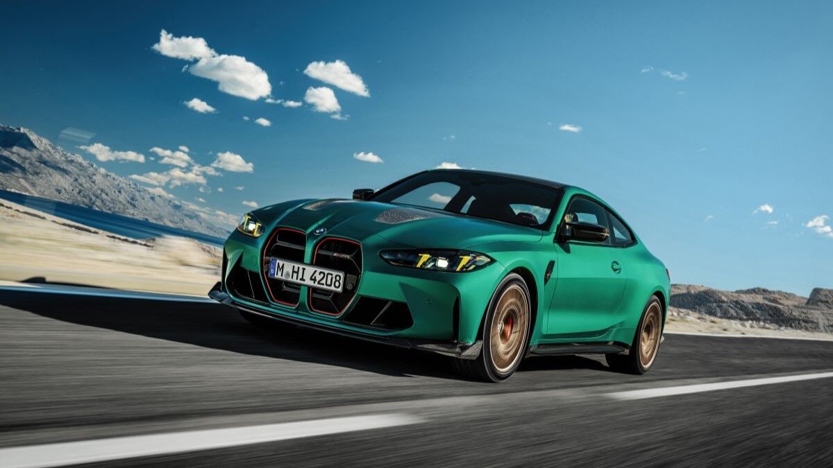 The 2025 BMW M4 CS in green seen from a front quarter angle