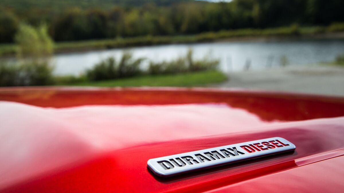The Duramax diesel badge on the hood of a GMC Sierra pickup