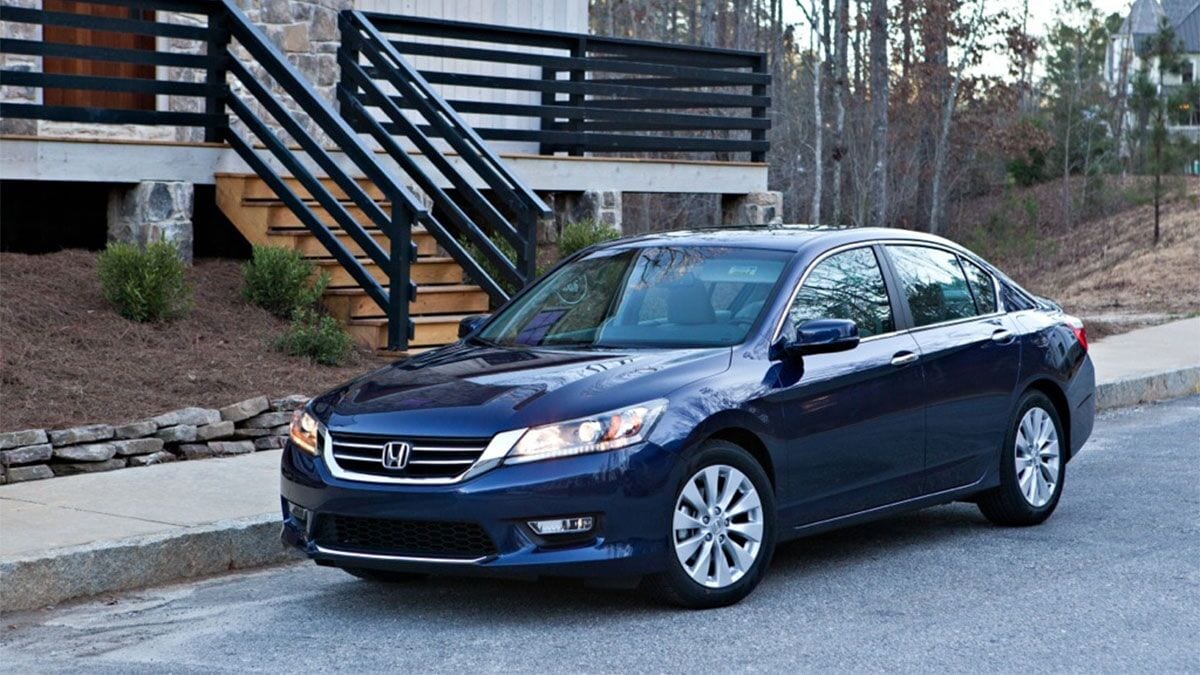 The 2013 Honda Accord in black seen from a front quarter angle