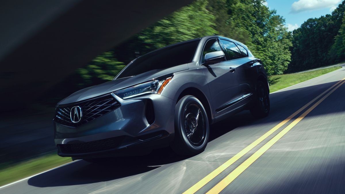 The 2025 Acura RDX in gray seen from a front quarter angle