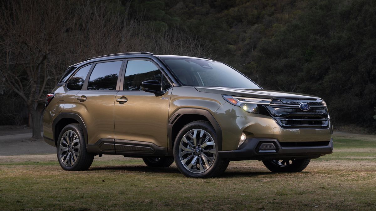The 2025 Subaru Forester Hybrid in green seen from a front quarter angle