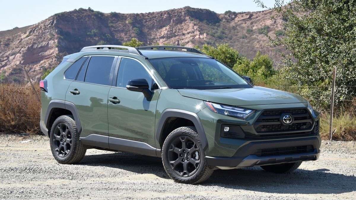 The 2025 Toyota RAV4 TRD in green seen from a front quarter angle