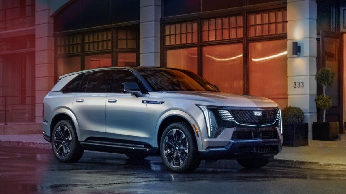 The 2025 Cadillac Escalade IQ in gray seen from a front quarter angle