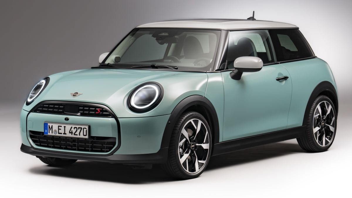 The 2025 Mini Cooper hardtop in green seen from a front quarter angle