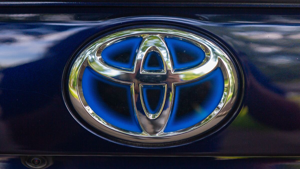 Toyota logo badging on a RAV4 Hybrid.