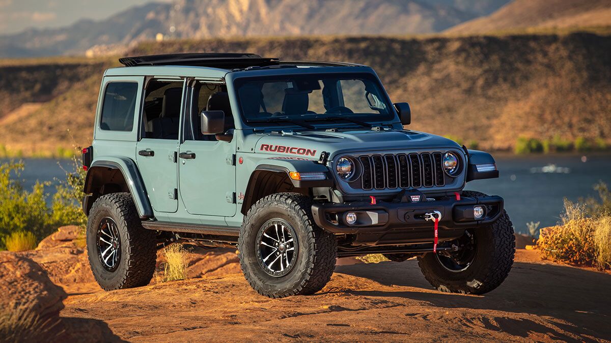 The 2025 Jeep Wrangler 4-door in blue seen from a front quarter angle