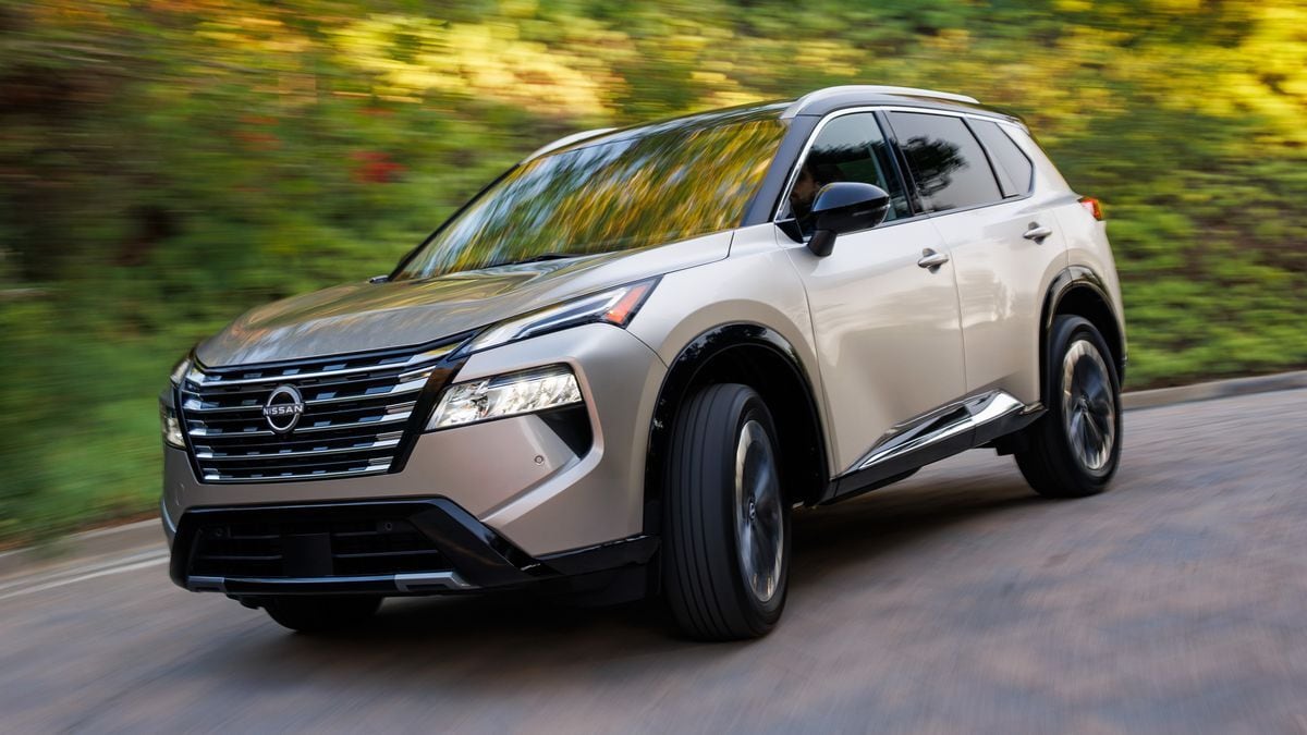 The 2024 Nissan Rogue in beige seen from a front quarter angle