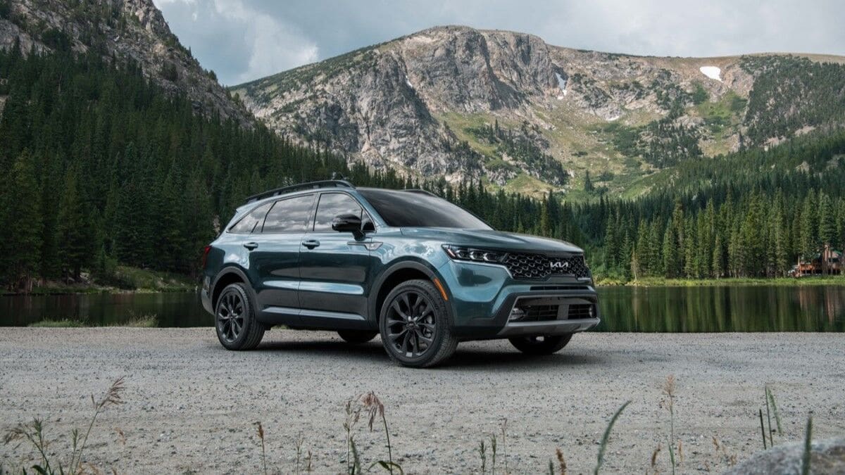 The 2023 Kia Sorento in green seen from a front quarter angle