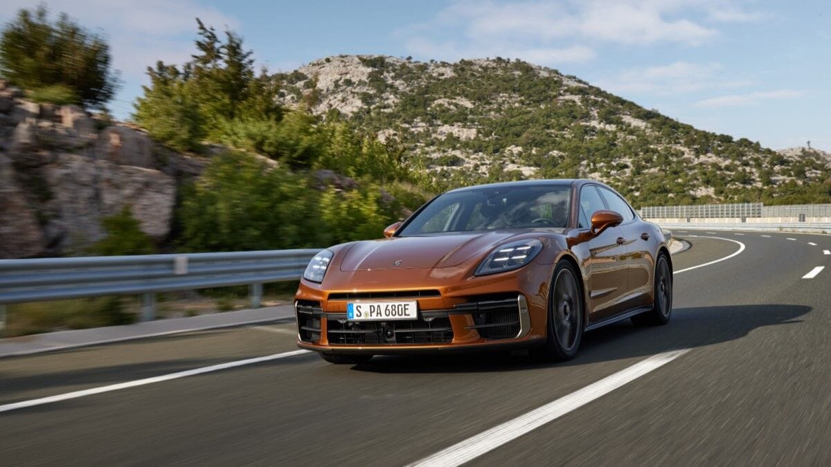 The 2024 Porsche Panamera in copper seen from a front quarter angle