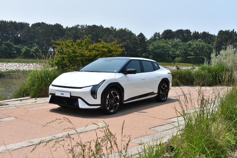2026 Kia EV4 parked near a pond