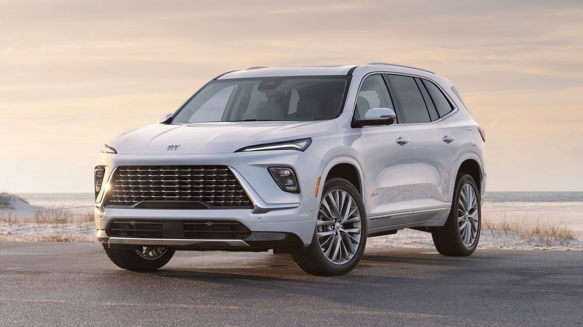 The 2025 Buick Enclave Avenir in white seen from a front quarter angle
