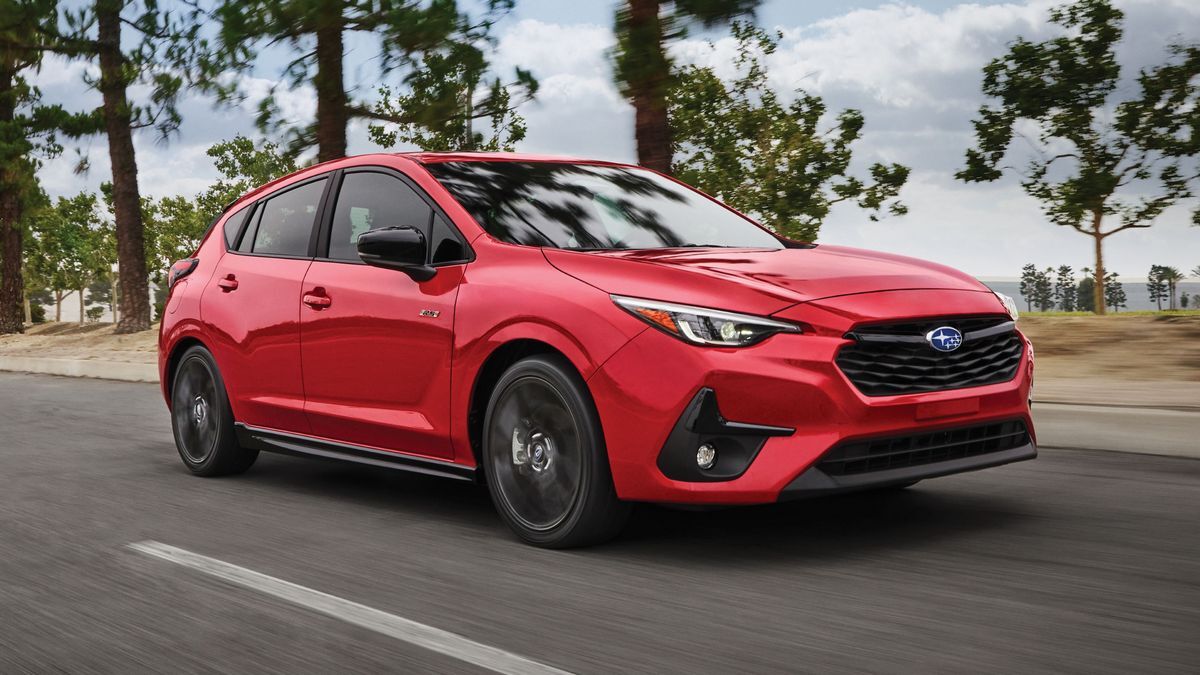 The 2025 Subaru Impreza in red seen from a front quarter angle