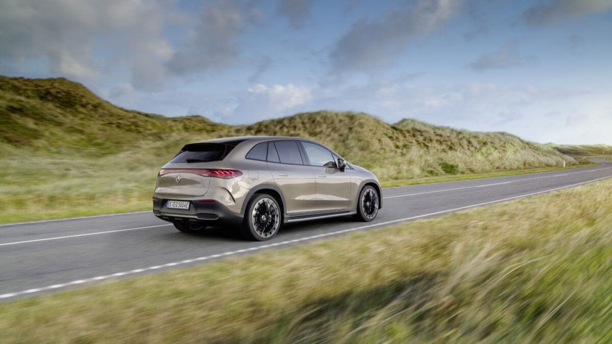 The Mercedes-Benz EQE SUV seen from a rear quarter angle