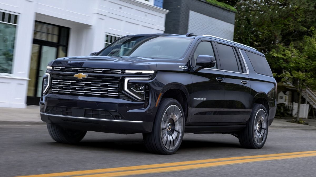 2025-chevrolet-suburban-high-country-driving-front-3qtr.jpg
