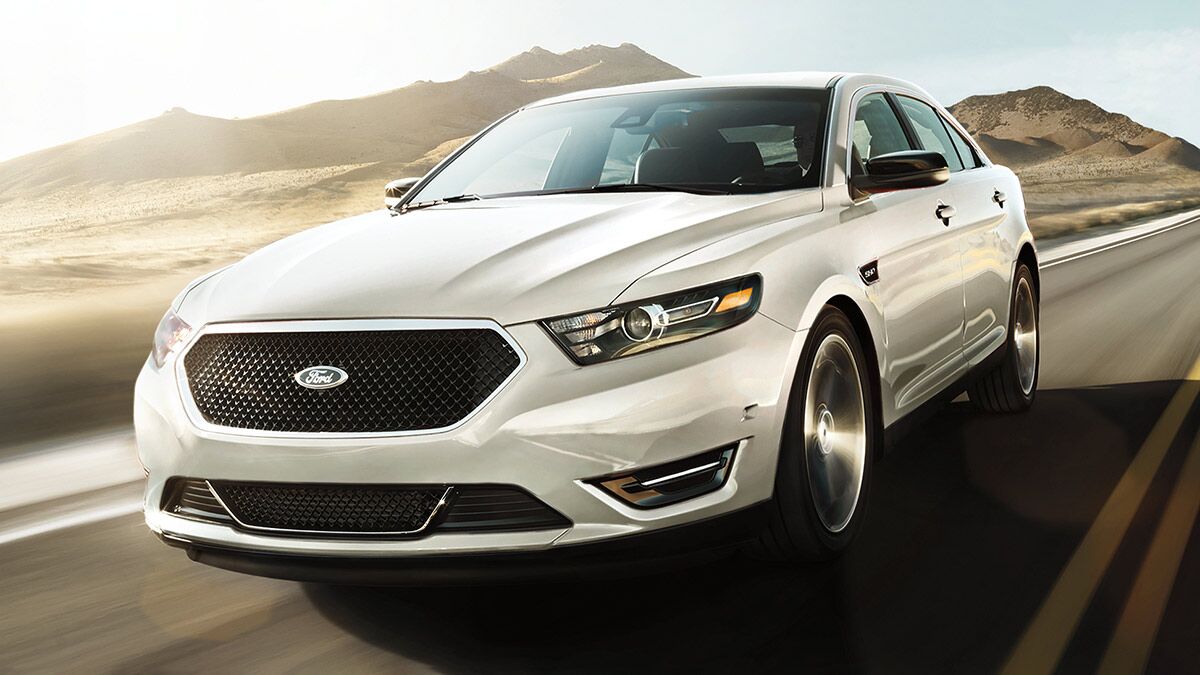 The 2019 Ford Taurus in white seen from a front quarter angle