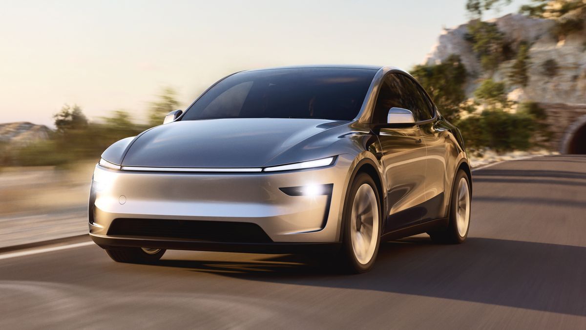 The 2025 Tesla Model Y in gray seen from a front quarter angle