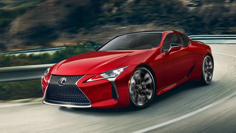 2025 Lexus LC driving through the mountains.